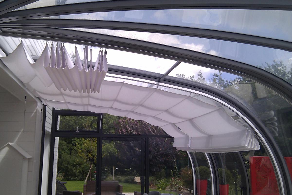 Abri de terrasse PELRE Solar véranda bioclimatique avec rotonde