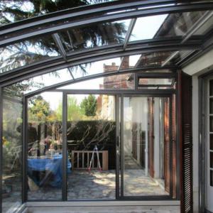 Véranda escamotable en aluminium transparente modèle TOPAZ
