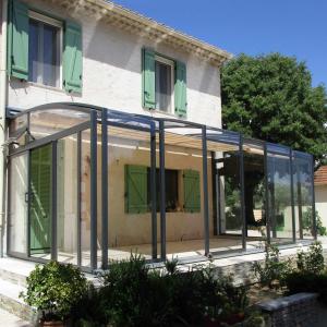 Verrière coulissante pour terrasse modèle TOPAZ Vöroka
