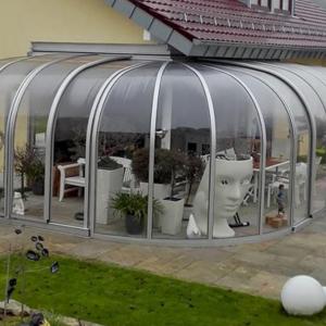 Abri de terrasse coulissant I Véranda ronde I Modèle PERLE Vöroka-Juralu
