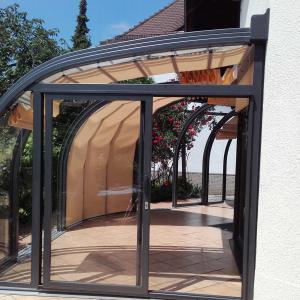 Véranda ronde I Abri terrasse coulissant I Modèle PERLE Vöroka-Juralu
